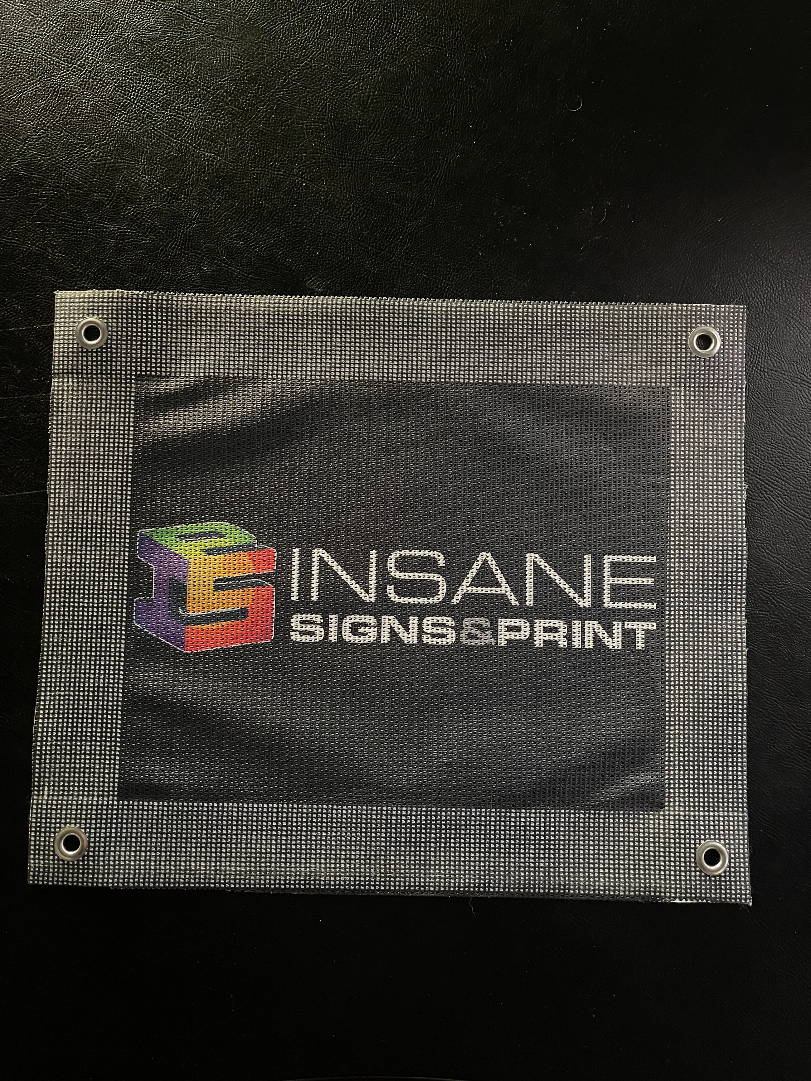 Front face of a printed mesh banner